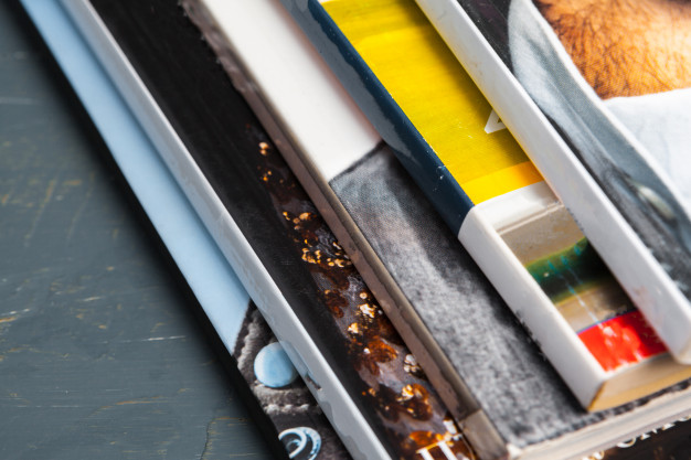 close-up-stacking-magazine-place-table-127657-18730.jpg